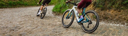 Two riders enjoying Gravaa on the cobblestones.